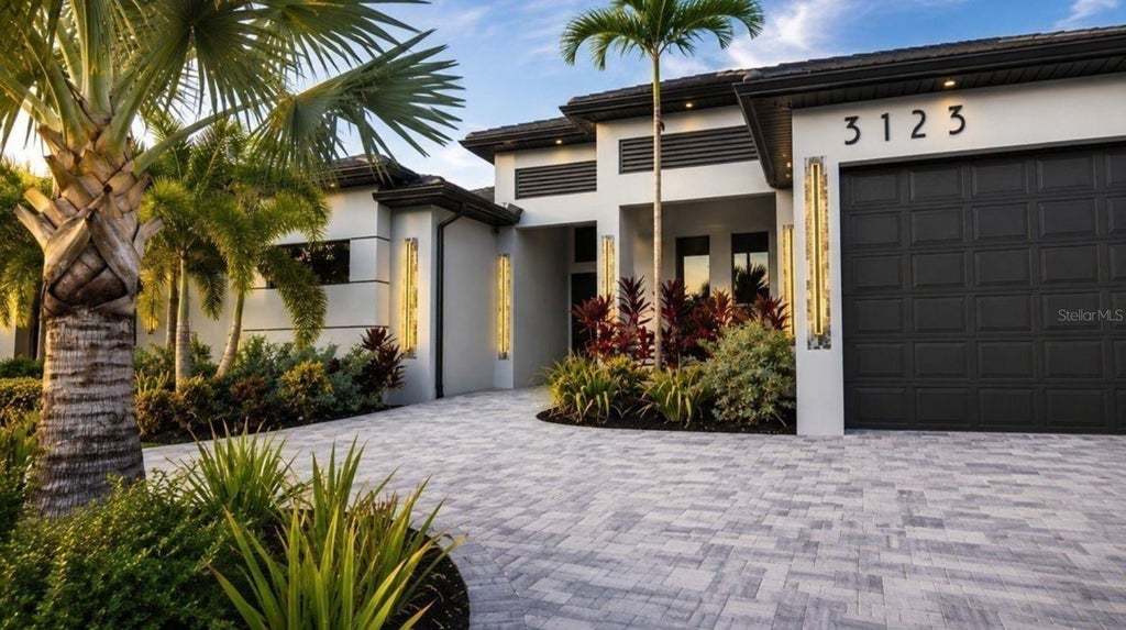 Photo of 3123 SW 29th Avenue, Cape Coral, FL 33914 (MLS # C7529168)