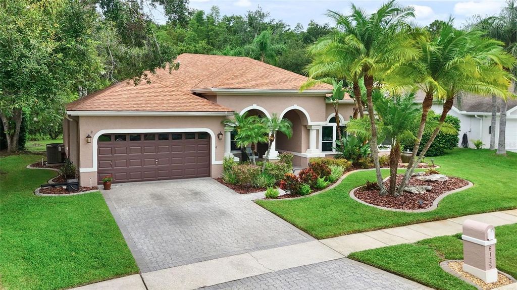 Photo of 6125 Savoy Circle, Lutz, FL 33558 (MLS # TB8410439)