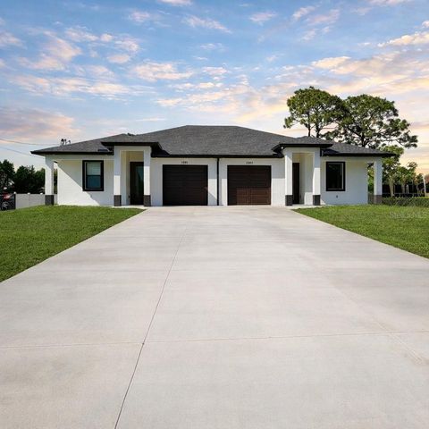 Photo of 1041 Albany Avenue, Lehigh Acres, FL 33971 (MLS # O6349251)