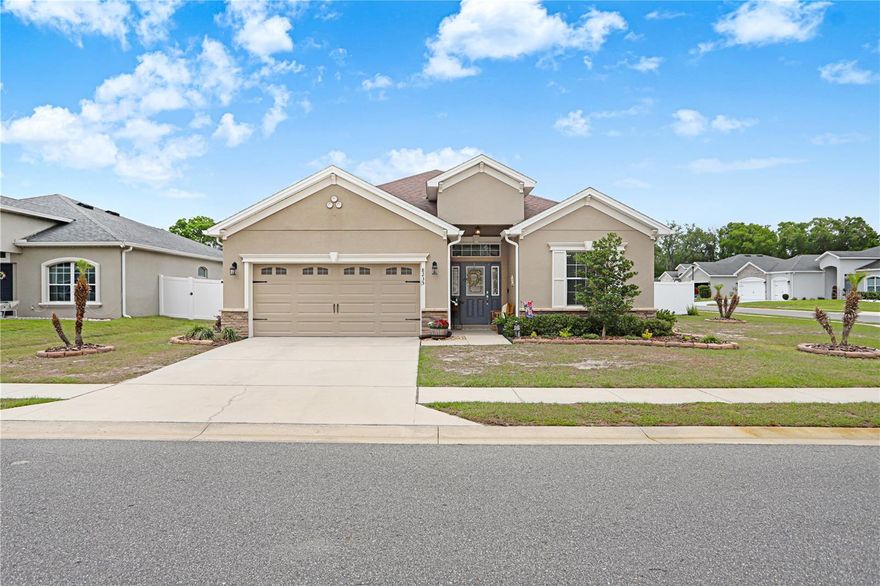 Welcome to the beautiful community of Wilder Oaks in Lakeland, Florida. When arriving at the property, you will notice the updated stone design on the home with newly planted trees and beautiful landscape that features plant borders on an over-sized premium lot so that when you have extra guests over, parking is a breeze. This 2019 better than new 4 bedroom /2.5-bathroom home features tall ceilings and crown molding with even newer recent upgrades. Upon entering, you are greeted with a spacious foyer as well as a half bath that has been recently upgraded with new mirror, lighting and an accent wall. Bedrooms 2 and 3 are past the foyer and one has a featured wooden slat wall that has been freshly painted, and both are connected by a Jack and Jill bathroom that offers granite countertops, double vanity and a tub/shower combo. Next, you will notice the open living room with a recently updated kitchen that includes a new backsplash, farm sink, dishwasher and soft close cabinets and drawers! The massive kitchen island has plenty of room for bar stools for extra seating as well as the open dining room give you ample space for gatherings with family and friends. Don't forget the Massive walk-in pantry for even more storage. The primary bedroom boosts double doors upon entry with fresh paint and carpet, tray ceiling, massive walk-in closet, double sinks with granite countertops, jacuzzi jetted tub, over-sized tile shower with new glass door and enclosure with a private closeted toilet. Bedroom 4 is currently being used as an office, and it has new carpet as well. The laundry room has plenty of room for all your washing needs as well as new granite on the folding table. The 2-car garage has plenty of room for your vehicles or toys.  A sliding glass door off the dining room leads to your own personal outdoor oasis with a large screened in patio/lanai that's perfect for sipping your morning coffee and listening to the birds sing. You will notice the backyard is over-sized with white vinyl fencing, beautiful landscape, paver area (15 x 15) and a new shed for all of your lawn equipment. Other upgrades include energy efficient radiant barrier, gutters, an internal pest control system, Doorbell with Camera, irrigation system and a Kinetico water softener system. 
This property is conveniently located off of 98 N and offers plenty of shopping and restaurants nearby as well as Tampa and Orlando are less than an hour away. Call today for a private tour of this well-maintained home.