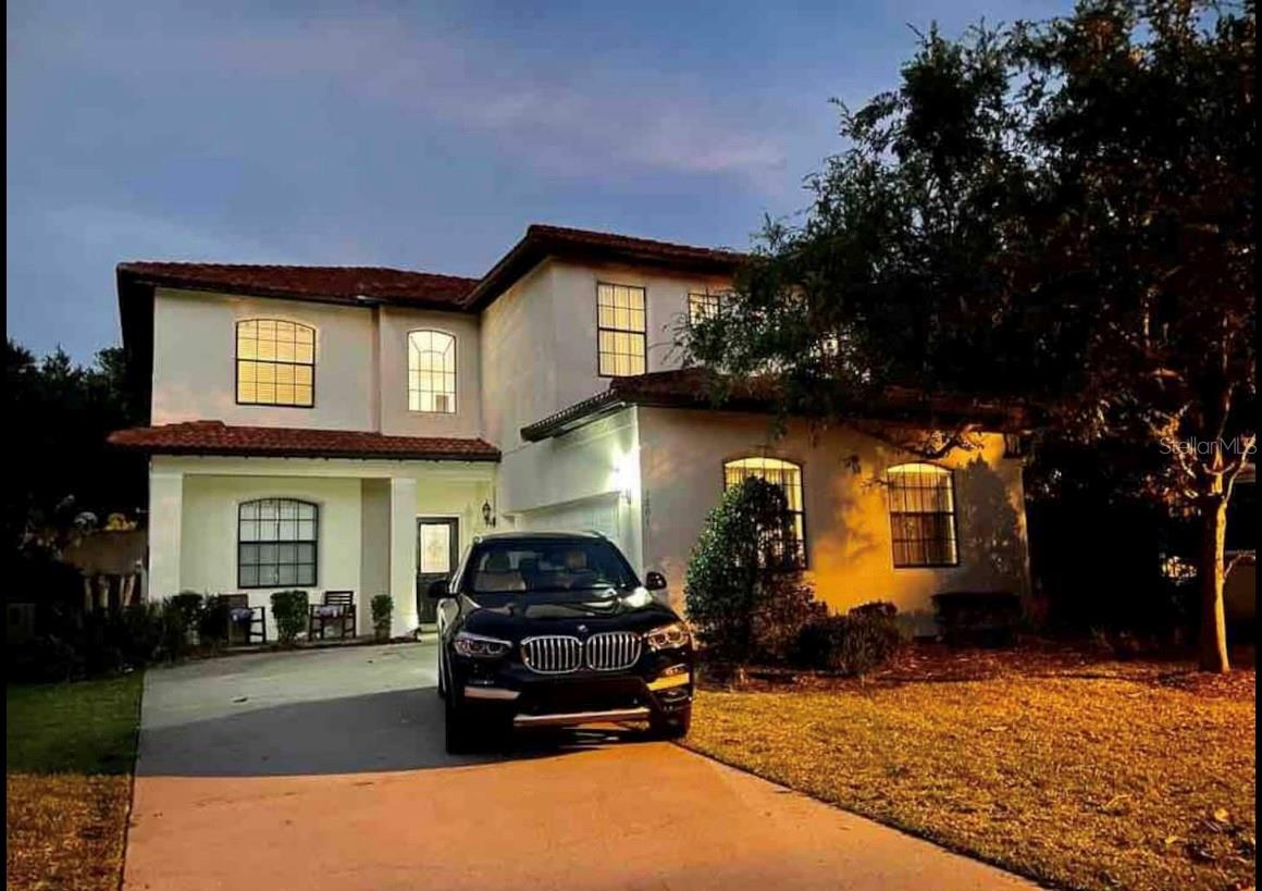 Stunning and well-maintained 5-bedroom, 3.5-bath pool home located in the highly desirable Tuscany community, This spacious two-story residence sits on a large corner and no rear neiborhood, lot with ample parking and offers a functional layout ideal for modern living or Airbnb - VRBO business opportunity , you’ll find high ceilings, generously sized bedrooms, and a bright open-concept main floor that seamlessly connects the contemporary granite counter top kitchen, dining, and family room. Two sets of sliding glass doors lead to a fully screened, heated private pool with a paved deck and covered lanai—perfect for relaxing or entertaining in the pool theater. The expansive upstairs features a large primary suite with roman tub, enclosed shower, and private toilet, a second ensuite bedroom, plus three additional bedrooms and a shared bath. Additional highlights include a separate laundry room, and oversized two-car garage. Cable, internet, and landscaping are included in the HOA fees. Whether you're looking for a primary residence, long or a short-term rental investment, this home offers exceptional comfort, space, and location. Schedule your private tour today—this opportunity won’t last long! included some Furnished, Just off Highway 192—minutes from shops, restaurants, and world-famous theme parks. This home has a strong short term rental history , but it is equally well- suited for a long term leasing or full time living . HOA FEE oncludeds lanscaping,cable, high sped internet. Dont miss the opportunity to get and amazing income here / Note : Listing Agent it is the Owner of this property
