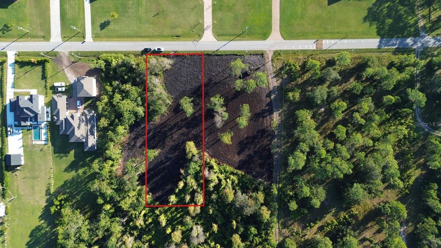 Exceptional 0.7-acre homesite with approx. 102 feet of frontage along Moore Street—one of the most prestigious streets in the area—surrounded by multi-million-dollar estates. This expansive lot offers a rare opportunity to custom-build your dream home in a premier location where properties of this caliber seldom become available.
The property backs up to a serene conservation area, offering a private environment with a quiet, secluded feel. Water service is available, and its generous dimensions (approx. 102 × 300 ft) provide ample space for a high-end residence, pool, extended-family suite, and outdoor living amenities—perfect for those seeking both sophistication and tranquility, nestled in a natural setting.
Opportunities like this are increasingly scarce. Whether envisioned as a private estate or a high-end speculative project, this parcel offers outstanding long-term value in an exclusive setting. The property is subject to surveying and lot split prior to closing.
For additional details or to schedule a private property tour, please contact the listing agent.