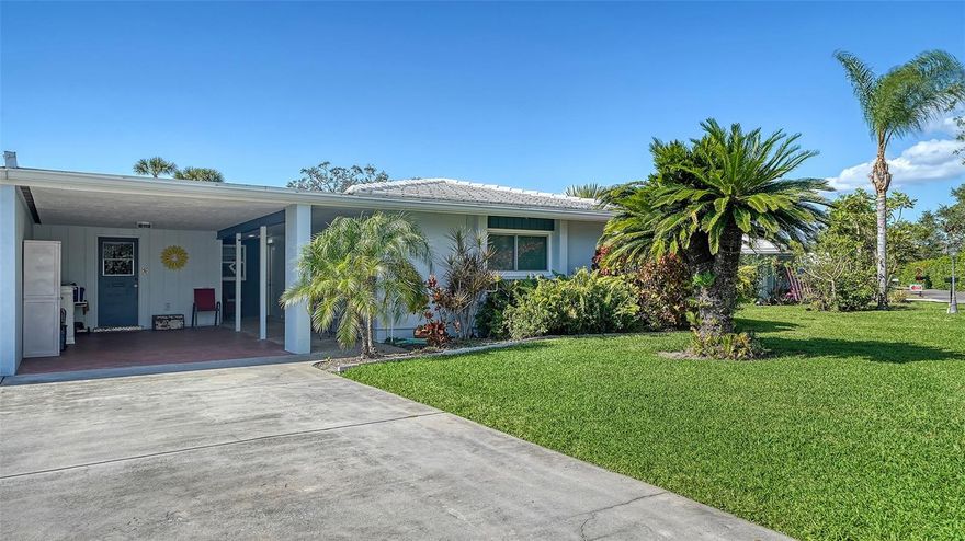 PRICE IMPROVEMENT! Welcome to this beautifully maintained 2 Bedroom, 2 Bath villa in the quaint 55+ community of Village Green in the heart of Sarasota! As you step inside, you are greeted by a warm and inviting ambiance, and a very spacious layout. The Living spaces are thoughtfully designed and boast ample room for relaxation. You will enjoy entertaining in the Living room/Dining room combo along with a huge Family room/Flex space overlooking a beautiful community landscaped area! The kitchen has modern amenities such as stainless-steel appliances, quartz countertops and convenient access to an eat in breakfast area. The Primary suite is oversized and consists of an updated ensuite with walk-in shower. The secondary bedroom is spacious, perfect for guests or a den, along with plenty of storage and easy access to the updated secondary bathroom. The Laundry room is off the kitchen and includes a sink and built in storage. The carport is ideal to keep your car protected and has a work bench and more storage! The Village Green community offers maintenance-free living including community pool, and beautifully landscaped surroundings. This community is centrally located to Sarasota’s quaint shops, fine dining and entertainment. UTC Mall, Yoder's, Der Dutchman and the Legacy Trail are all nearby. Short drive to Sarasota Airport and major highways. Schedule your viewing today and experience the possibilities firsthand!