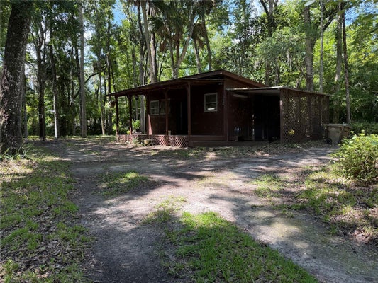 23946 INDIGO RD, ASTOR, FL 32102 - Image 5dfea8806db9c98859e6471df577b032/776649602