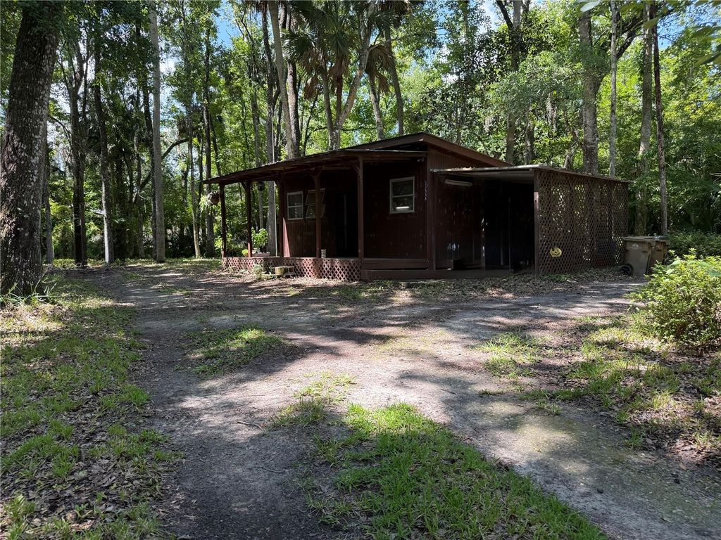 Photo of 23946 Indigo Road, Astor, FL 32102 (MLS # W7887202)