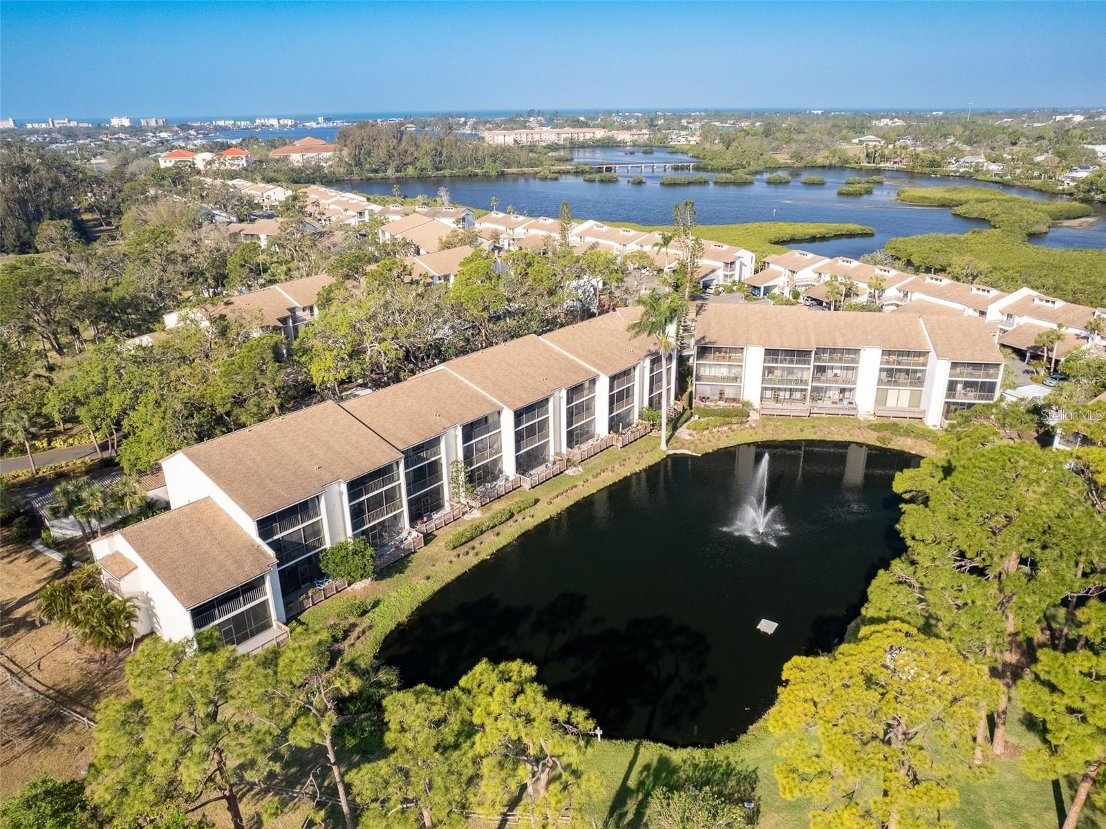 Beautiful unit with sweeping views of the lake. 1 bedroom, 1 bath unit located in Bird Bay Village. The condo is situated
on the ground floor with extended deck off the patio. The kitchen is located at the front of the unit with several of
cabinets for storage. The living area offers sweeping lake views, and a large screened lanai overlooks the pond with a
fountain. The lanai is an excellent place to enjoy a card game, bird watching, morning coffee, or cocktails. The laundry
closet includes a full-size washer and dryer. The primary suite is spacious and includes a walk-in shower, slider out to
lanai, and his/her closets. There is plenty of storage available, including a storage space in the foyer, in the carport, and
a covered carport space. Bird Bay is a resort-style community with mature landscaping and endless amenities, including
pickle ball courts, 4 pools, tennis courts, shuffleboard, a library, meeting room, and fitness room. The location is ideal,
as it is only 5 minutes away from Downtown Venice shopping, restaurants, and beautiful Venice Beach.