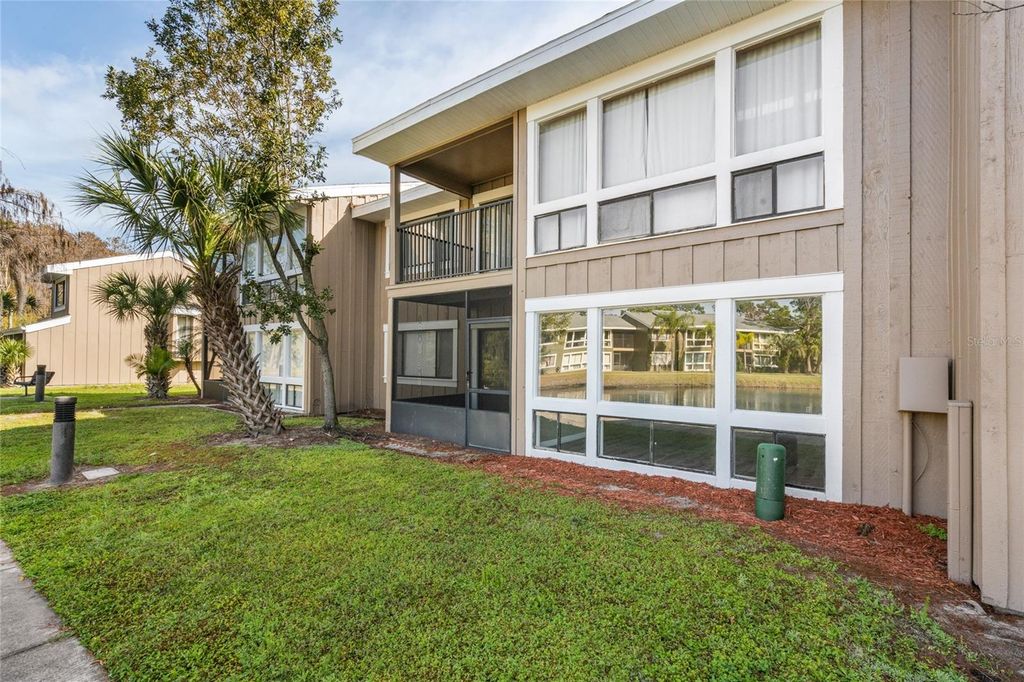 Photo of 5838 Peregrine Avenue #E03, Orlando, FL 32819 (MLS # O6354165)