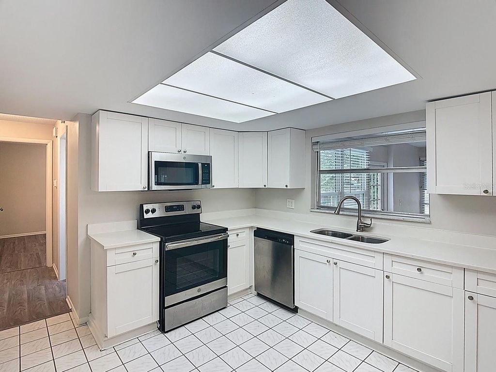 Photo of 11320 Currie Lane, Largo, FL 33774 (MLS # TB8440437)