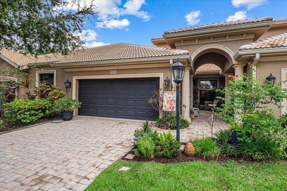 Welcome to Bougainvillea Place – where maintenance-free living meets resort-style amenities.
This beautifully designed 3-bedroom, 2.5-bath townhome offers the perfect blend of comfort, style, and convenience for today’s lifestyle.
Step inside and immediately notice the vaulted ceilings and diagonal tile flooring that set the tone for the open living and dining areas, complete with custom lighting. The kitchen features white cabinetry, stainless steel appliances, a pantry, and bar seating, making it as practical as it is inviting. Just off the kitchen, a cozy family room provides the perfect space to relax.
Your primary suite is conveniently located on the first floor, offering a large bedroom, walk-in closets, and a spa-like ensuite with a walk-in tile shower, garden tub, split vanities, and a private water closet. Upstairs, two bedrooms share a Jack & Jill bath with double vanities, and a loft space adds flexibility and would make a great reading nook.
Enjoy outdoor living on your covered porch with an extended patio, or take advantage of the community’s resort-style amenities—a sparkling pool, clubhouse, fitness center, and even a small dog park for your furry friends.
Additional highlights include a laundry room with storage and wash sink, newer AC (2020)(2018), hot water heater (2021), and refrigerator (2021) for peace of mind.
Located in a gated, maintenance-free community just minutes from Ellenton Premium Outlets, dining, shopping, and with quick I-75 access, this home offers everything you need for a low-maintenance, convenient lifestyle.
If you’ve been searching for comfort, convenience, and community amenities all in one perfect location—welcome home.