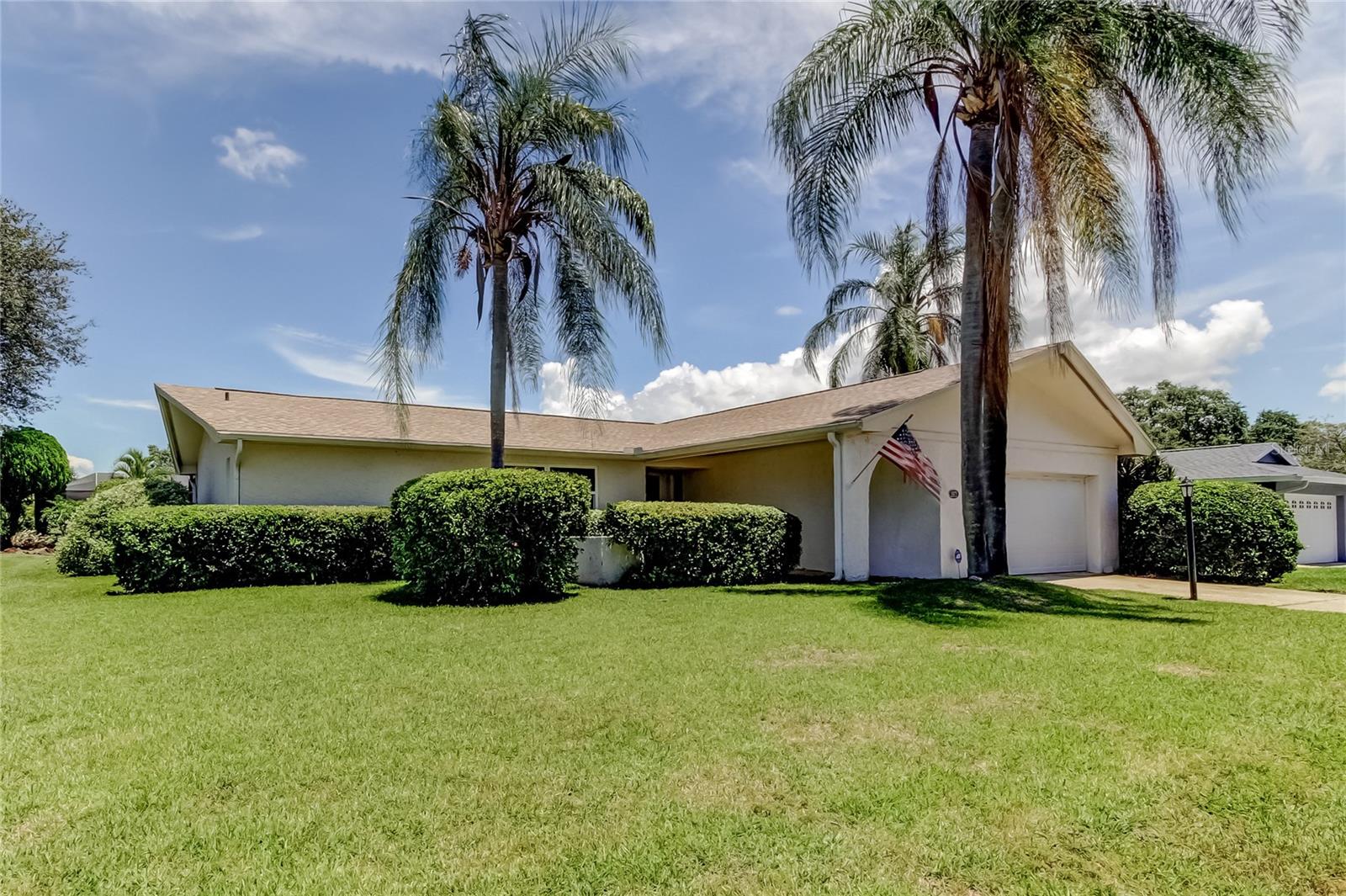 Highly desirable pool home on a quiet cul de sac in the heart of Countryside, Clearwater, Florida. This is the perfect home to "live like you are on vacation", raise a family, or an active and comfortable retirement. Timber Ridge is a warm and welcoming neighborhood with close proximity to Chi Chi Rodrigeuz golf course, Clearwater Country Club, Countryside Recreation Center, Countryside Mall, Clearwater Beach, St Pete beach and Honeymoon Island, Tampa International Airport and St. Pete/Clearwater Airport, and great schools. Added value is the fact this home is not in a Flood Zone and sits at one of the highest elevations in Pinellas County. Roof is only 2 years old!
The home features three generously sized bedrooms, each thoughtfully positioned for privacy and comfort. The Primary Suite: the primary bedroom boasts plush carpeting with an ensuite bath and a spacious walk-in closet. Sliding doors lead directly to a screened covered patio—ideal for a quiet morning coffee or evening stargazing. Second Bedroom: Perfect for guests or family, the second bedroom is airy and bright, with a large closet and easy access to the second full bath. Third Bedroom: Versatile in function, the third bedroom can serve as a home office, nursery, or creative studio. Its large window frames a lovely pool view, inspiring productivity or restful sleep alike.
A true split floor plan has you set up for success when entertaining. Featuring a formal living and dining room on the same side as the Master bedroom and a Family/Dining room combo on the other side of the home (still separate from the second and third bedrooms) Both have access to the screened covered patio which leads to the pool area. Interior laundry room has a utility sink as well as plenty of room for a large washer and dryer.
The pool in this home is beautifully maintained, open and airy. Boasting a seating area and Bar-B-Que area ready for entertaining. The well maintained mature landscaping creates a serene atmosphere for your complete enjoyment.