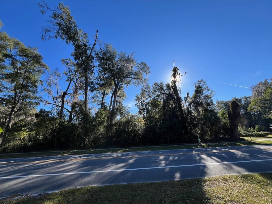 Welcome to the perfect canvas for your dream home! This oversized residential lot, situated in the heart of downtown High Springs, offers a unique opportunity to embrace city living with a touch of nature. Just minutes away from the springs and rivers that make High Springs famous, this property combines convenience, space, and natural beauty.
You can enjoy the best of both worlds with the convenience of downtown High Springs living. Immerse yourself in the charm of the town and relish quick access to the enchanting springs and rivers. I-75 is just a stone's throw away, enhancing the accessibility of this central location. This expansive lot provides ample space for your dream home and outdoor amenities. Let your imagination run wild as you plan the perfect residence tailored to your lifestyle.
Benefit from paved road frontage, ensuring easy access to your property and adding to the overall convenience of city living.
Choose your own builder and bring your unique vision to life. The open builder policy allows for flexibility, enabling you to create a home that perfectly reflects your style and preferences.
Experience the ease of city living with readily available utilities, streamlining the development process and ensuring a smooth transition into your new home. An abandoned 60' easement on the NW side of the property provides a natural tree buffer, offering privacy and a serene backdrop to enhance the overall character of your future residence.
Revel in the natural beauty of High Springs with the famous springs and rivers just minutes away, providing a constant connection to the outdoors. Don't miss out on this exceptional opportunity to secure an oversized residential lot in downtown High Springs. Contact us today to schedule a visit and explore the endless possibilities that await you in this prime location!