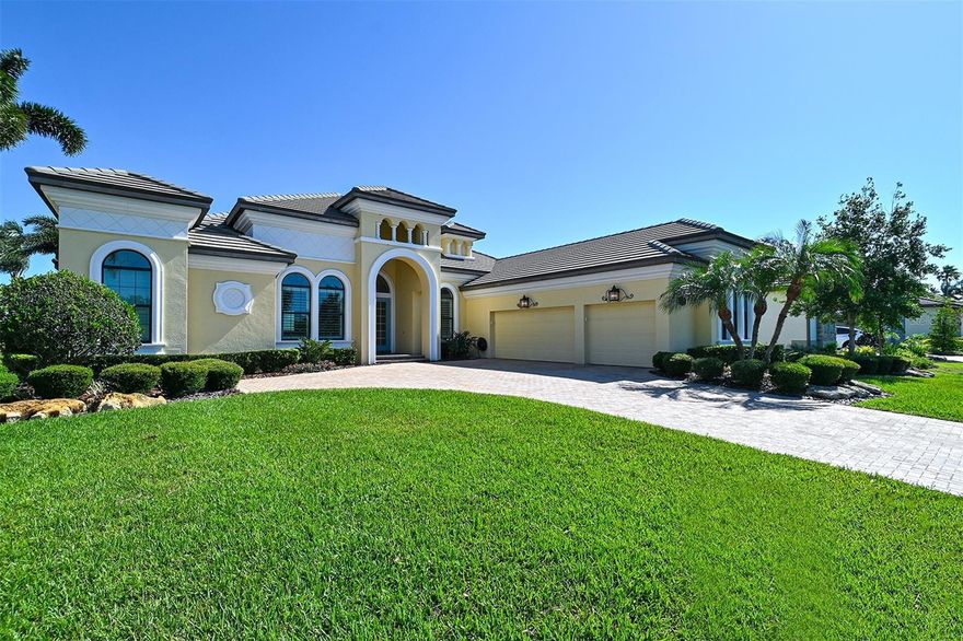 Light and bright pastels reflect the open water views from this immaculate classic coastal Rutenberg designed home. A gated community of newer homes, Hawk Island, offers everything you hope to find on a private island without the exposure and inconvenience. Mile wide water views of the Manatee River and protected deep water dockage on the canal define a gracious Florida lifestyle. Luxury features include high ceilings (12 ft) an open floor plan with four bedrooms, three baths, formal dining room and den office. High-impact rated sliding doors reveal the pebble stone saltwater pool, and travertine deck. The caged pool area features a spa, and gas fire pit. Noseeum mesh screening encourages full use of the outdoor shower and summer kitchen. Inside a flowing floor plan is accented with fine finishes that include porcelain tile floors throughout the main living areas, a cook’s kitchen with quartz counters, gas cooktop and oven, walk-in pantry, and wet bar. A separate master wing en suite arrangement with engineered wood floors in the bedroom, and marble bathroom with natural light throughout will satisfy the most discerning taste. The large garage has abundant cabinet storage, butcher block workspace, and new whole-house hot water on demand.

Hawk Island is located conveniently near shopping, and also provides quick access to I75 (3.5 miles). Work or play from Sarasota to St. Pete; it’s all within easy reach. Enjoy living on the pristine Manatee River with direct access to the Gulf of Mexico. Consider the mainland alternative to the seasonal crowding, traffic, red tide, and exposure on the barrier islands.