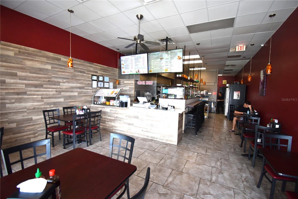 Photo of 2751 S Chickasaw Trail #107, Orlando, FL 32829 (MLS # O6437610)