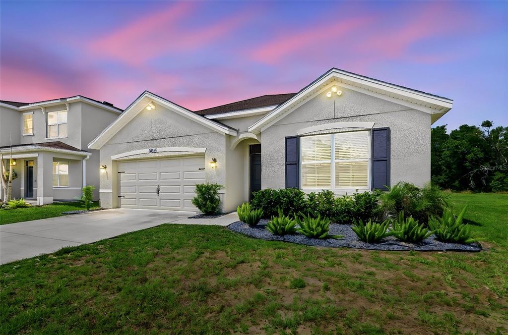Photo of 30685 Summer Sun Loop, Wesley Chapel, FL 33545 (MLS # TB8510269)