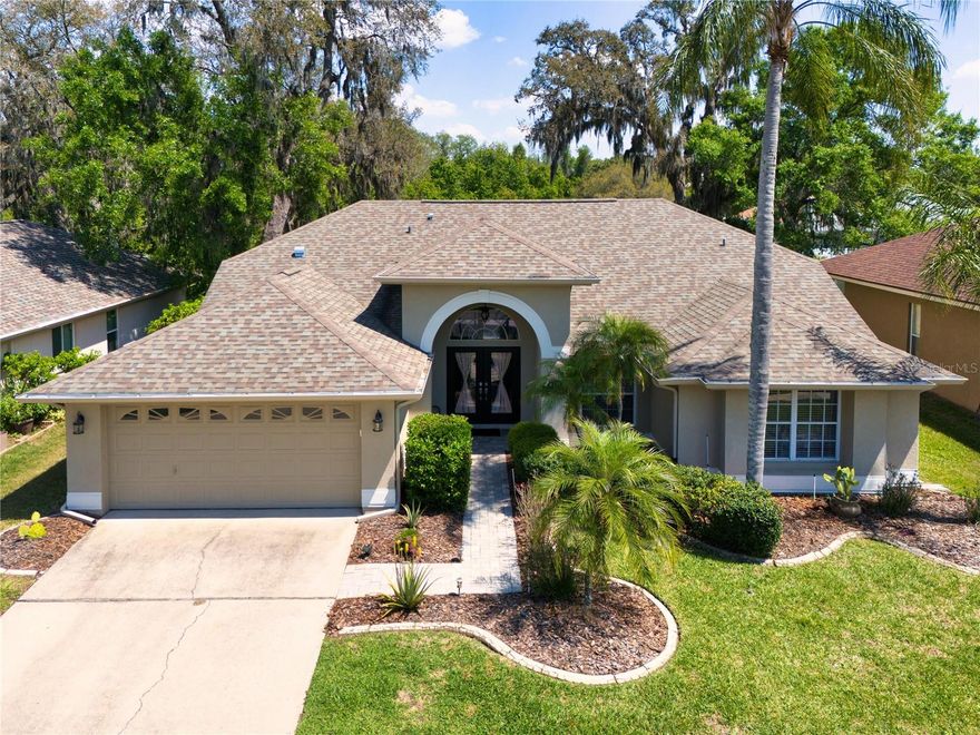 Bright, spacious, and beautifully inviting, this 4-bedroom, 2-bath pool home delivers the perfect blend of comfort, privacy, and location in one of Trinity’s most desirable neighborhoods. Set on a premium conservation lot with no rear neighbors, the home delivers exceptional privacy and serene natural views. Inside, the open floor plan creates an airy, welcoming feel, while the no-carpet design adds style and easy maintenance.
The spacious primary suite features a walk-in closet, garden tub, tiled shower, and private water closet. The flexible 4th bedroom can also serve as a home office or den, giving you the versatility today’s buyers want. Step outside and enjoy your own saltwater pool with the peaceful backdrop of a preservation lot.
Major updates provide peace of mind, including ROOF (2021), hot water heater (2021), pool pump (2022), rain gutters (2022), HVAC (December 2022), water softener (2023),  electric range (2025) and fresh interior paint (2025). With low HOA fees, Pasco County taxes, and convenient access to both Tampa International Airport and St. Pete-Clearwater Airport, this home combines lifestyle, value, and convenience in one exceptional package.