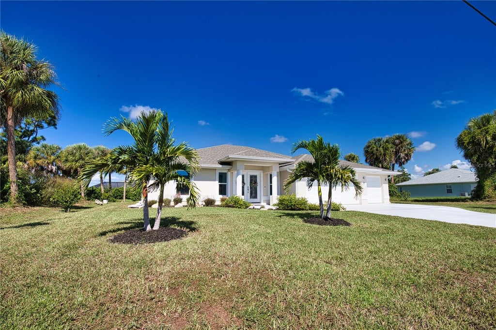 Photo of 67 Long Meadow Lane, Rotonda West, FL 33947 (MLS # D6149207)
