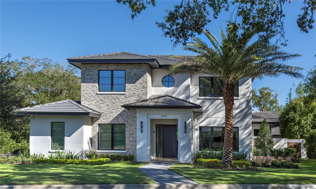Location meets beauty and state-of-the-art convenience in this impressive Winter Park home. Built in 2017 by Maroon Fine Homes, this home features a long-lasting concrete tile roof and stone tile accents combined to create a stately first impression. Hardwood floors greet you at the front door, bringing a warm elegance to all common areas throughout the home. Large clad windows let in plenty of light. The windows feature insulated & argon-filled glass with Low-E coating. The tankless water heater runs on natural gas and the high-efficiency Carrier heat pumps work together to lower energy costs in hot or cold weather. The bright and open kitchen features granite countertops, all-wood custom-built cabinets by AWR Cabinetry, Thermador appliances, and a Sub-Zero wine cooler. In every bath, you’ll find beautiful, durable porcelain tile, as well as plenty of under-sink storage. Keypad controlled audio visual, security and Lutron lighting system puts the ultimate in convenience at your fingertips. The covered back porch with travertine pavers extends the livable space outside for comfortable lounging, swimming in the inviting rectangular pool, dining al fresco or gathering with friends around the firepit. This lovely home is conveniently located just minutes from Central Park and the stylish boutiques and diverse restaurant offerings of the Park Avenue shopping district. Note: Pictures were taken in 2017 by original owner.