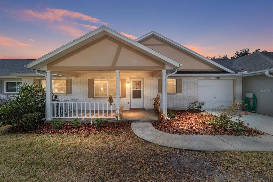 Welcome home to the much sought-after, active 55+ community of On Top of the World. This beautifully remodeled Birmingham model villa is move-in ready and ideally located on a quiet tree lined street in this serene golf community. An extended driveway leads to a charming covered porch; perfect for enjoying your morning coffee. The home features a 1.5-car tandem garage, ideal for extra storage, a golf cart, or a workshop area. Inside, you’ll find a thoughtfully updated interior featuring beautiful granite countertops and brand-new stainless steel appliances in the kitchen, along with recessed lighting, fresh paint throughout, and new LifeProof vinyl flooring. Major upgrades include a 2023 roof, new HVAC system, and new windows (pending installation), offering peace of mind and energy efficiency. Both bathrooms have been nicely updated with modern finishes. This 55+ gated, golf-cart-friendly community offers unmatched convenience near shopping, dining, healthcare, and entertainment, along with world-class amenities: 3 swimming pools (2 outdoor, 1 indoor), 2 fitness centers, tennis, pickleball, bocce, shuffleboard, horseshoes, golf, billiards, archery, dog parks, RC flying and racing, a library, restaurant & pub, and 100+ clubs plus live music every weekend at Circle Square giving you endless opportunities to stay active, social and entertained. HOA covers: lawn care, trash & recycling, basic cable, roof repair, exterior painting, irrigation water, structure insurance, and guarded security. This updated, low-maintenance villa is the perfect blend of comfort, convenience, community, and carefree fun. Trade chores for amenities, neighbors for friends, and routine for adventure.The community is also conveniently located near the World Equestrian Center. With Ocala continuing to grow and attract new development, this is a wonderful opportunity to enjoy comfort, convenience, and an active lifestyle in one of the area’s most desirable communities.