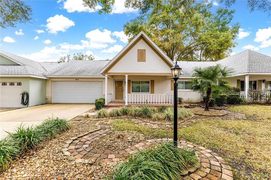 Welcome home to the much sought after, active 55+ community of On Top of the World. This Montgomery model is move in ready! When pulling up you will immediately notice the pretty tree-lined streets, paver walkways and mature landscaping. The front porch is the perfect spot for you morning cup of coffee. Once you enter there is new wood look laminate flooring throughout the main living areas. NO carpet in this home. This homes features are: Recently painted, Stainless Steel appliances, Microwave is also convection, Corian Counters including added cabinets in room off of kitchen, Refaced cabinets with new hardware, Custom under cabinet lighting with remote, Tiled backsplash, 5" baseboards, Honeycomb pull down blinds, Solar tube in the Living/dining area, Windows in 2016, Hot water heater 2023, HVAC in 2018. Updated fans and fixtures. Recessed lighting. Double insulated attic. Wall added off kitchen to make a private flex space/office. Screen room in the back and rock beds for low maintenance. Primary bedroom can easily accommodate king size furniture, ensuite with walk-in tiled shower featuring a new door. Corian counter tops in both baths. AND SO MUCH MORE! Call for your appointment to see today!