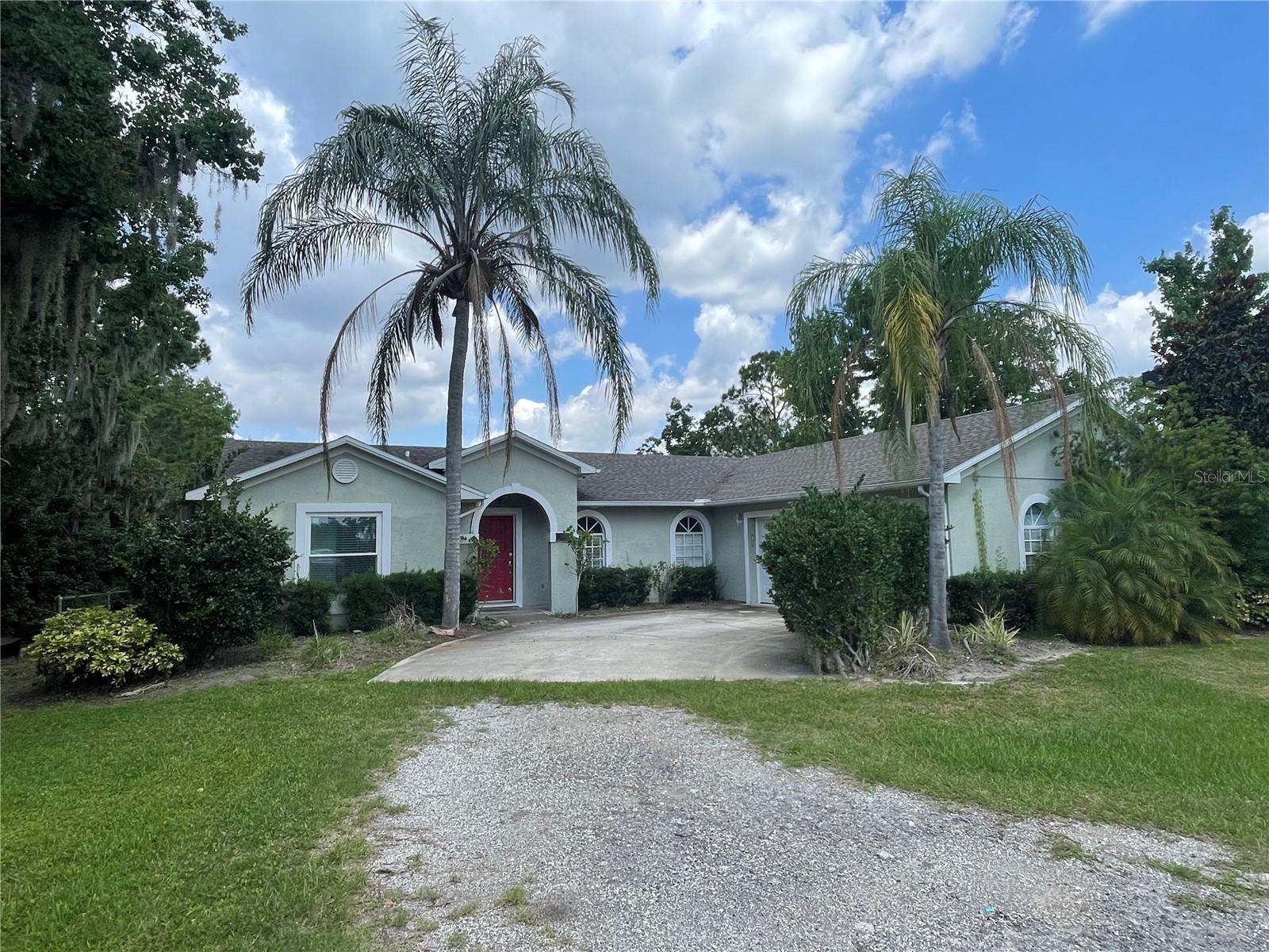 Private LAKEFRONT estate home on that sits on almost 2 acres of land, gated for extreme privacy! Fully furnished with an open floorplan great for families and entertaining. This home features 3 cozy bedrooms with a king, queen, and full bed to accommodate all guests comfortably. Enjoy the convenience of 2 bathrooms, one with a relaxing jetted bathtub. Kitchen features butcher block countertops, a wet bar, and island overlooking the living and dining space. The home also has a laundry room and 2 car garage. Large front yard to play and a large backyard with firepit overlooking Lake Sawyer. Sit on the back patio with your morning coffee, listen to the birds chirp and take in the views of the Lake. In the evening time, you will witness the most breathtaking sunsets and you can enjoy the Disney Fireworks nightly over the lake. Lake sawyer is connected to little lake sawyer and both are perfect ski lakes. Close proximity to all the theme parks, grocery stores, restaurants, great shopping and everything Orlando has to offer. This private paradise is truly one of a kind, will not last long. Call now to schedule your showing before its too late
