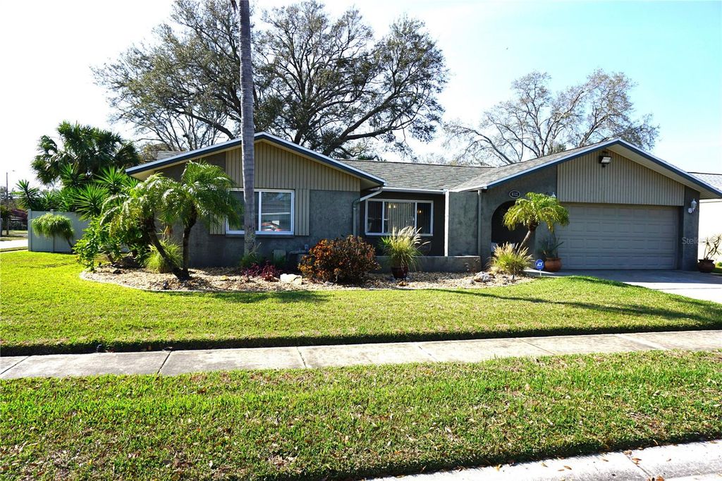 Photo of 6522 Woodland Boulevard N, Pinellas Park, FL 33781 (MLS # TB8477855)