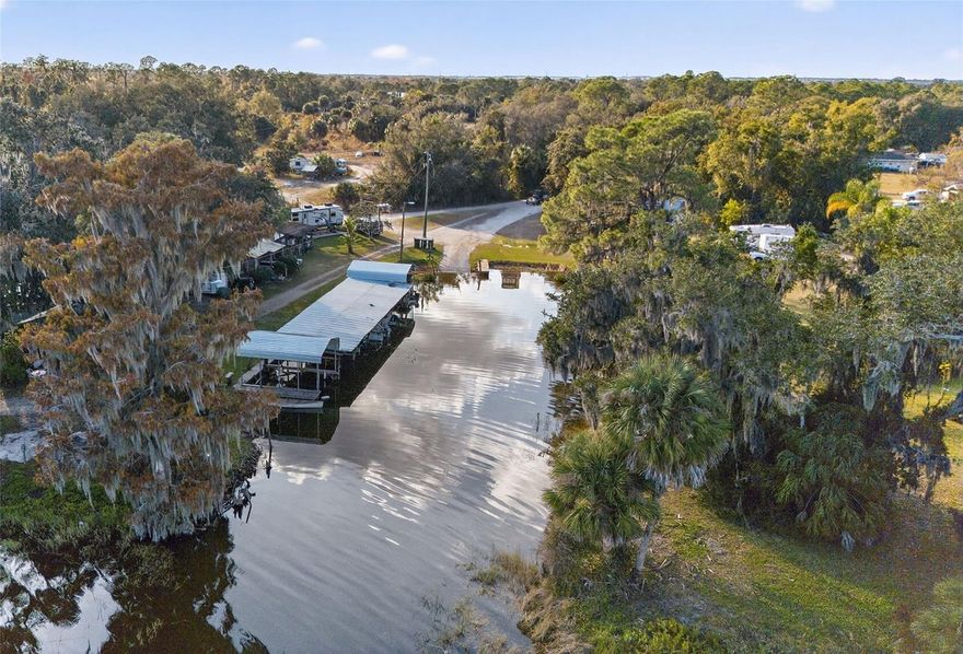 Rare Lake & Lagoon Frontage Vacation Destination Business Opportunity on Tranquil Lake Marion.
Bannon Fish Camp is a legendary angler’s retreat, proudly serving fishing tournaments and vacationers since the 1950s. This beloved, old-Florida property has remained in the same family for four generations and offers a truly unique blend of history, income, and waterfront access.
An expansive dock at the mouth of the lagoon provides convenient boat launching, while the lagoon itself features approximately 233 feet of navigable frontage leading directly to the Lake Marion outlet. The fish camp includes seven boat slips along the lagoon, currently rented at $150 a month each. An additional concrete dock at the lagoon outlet accommodates larger vessels and cargo transport.
All fish cabins are fully occupied with long-term tenants, and additional on-site trailers and dwellings are also tenant-occupied, generating approximately $3,800 in monthly rental income.
This offering presents an exceptional opportunity for investors, operators, or those seeking a historic waterfront business. The property may also be purchased in combination with the adjacent estate lakefront home and pasture land, providing expanded development or lifestyle options.
See Realtor Remarks for additional purchase options.