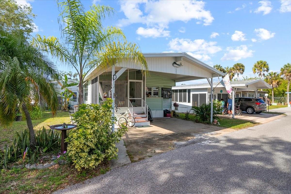 PRICE REDUCTION!!! Welcome to sunny Bradenton in this active 55+ Community! Enjoy the heated pool, shuffleboard courts, and meeting new friends in the Clubhouse! Take a walk or pull out the golf cart on your way to planned winter activities within the community. This home is sporting a large eati-in kitchen perfect for entertaining visiting family and friends. This home also features a laundry room as well as a large shower. new flooring throughout, oversized carport, and a spacious front screen porch area. VERY LOW HOA dues of $183 per month go a long way covering cable, internet, trash, mowing and grounds maintenance and common area upkeep.