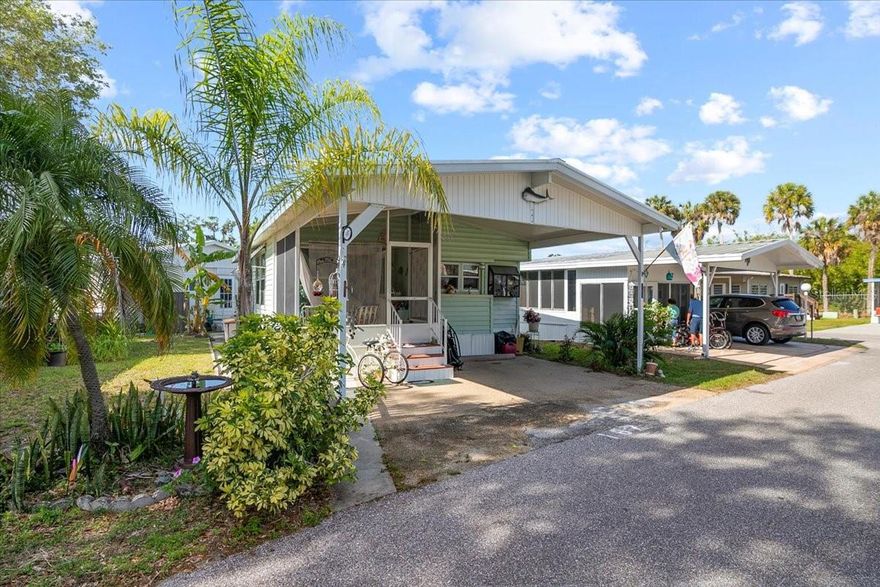 PRICE REDUCTION!!! Welcome to sunny Bradenton in this active 55+ Community! Enjoy the heated pool, shuffleboard courts, and meeting new friends in the Clubhouse! Take a walk or pull out the golf cart on your way to planned winter activities within the community.  This home is sporting a large eati-in kitchen perfect for entertaining visiting family and friends.  This home also features a laundry room as well as a large shower. new flooring throughout, oversized carport, and a spacious front screen porch area.  VERY LOW HOA dues of $183 per month go a long way covering cable, internet, trash, mowing and grounds maintenance and common area upkeep.
