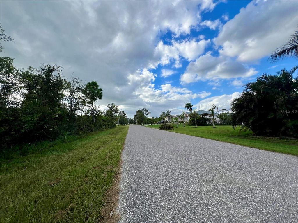 Photo of 12189 Vaughan Avenue, Port Charlotte, FL 33981 (MLS # C7498866)