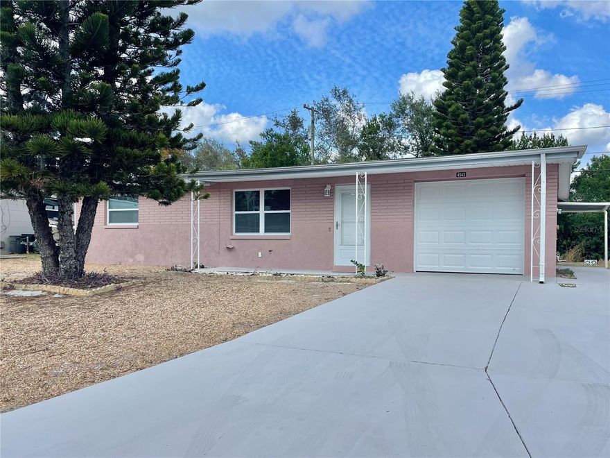 PRICE REDUCED FOR A QUICK SALE!
Better than new! This home has been completely remodeled- just bring your things!
Situated on the city limit of Holiday and Tarpon Springs, this turn key property awaits. As you enter the door you will be welcomed by the openness and luxury waterproof vinyl plank flooring throughout. New energy rated windows just installed. The Kitchen boasts all stainless steel appliances, granite counter tops, and subway tile backsplash, helping it to look high end. The bathroom features new wood-look tile, shower and tub combo, vanity, toilet, mirror and light fixture. New roof installed Nov. 2021, New AC August 2022, New drainfield June 2022, Brand new garage door and garage door opener, New doors inside and out, fresh paint inside and out as well. The backyard is huge! and includes a shed. No rear or front neighbors! Just miles away from the sponge docks, beaches, shopping, dining, and more! 
Don't wait. Schedule your showing today!