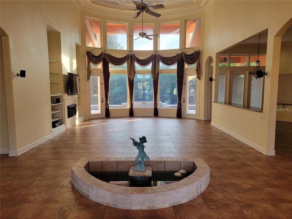 Photo of 10209 Thurston Groves Boulevard, Largo, FL 33778 (MLS # TB8473687)