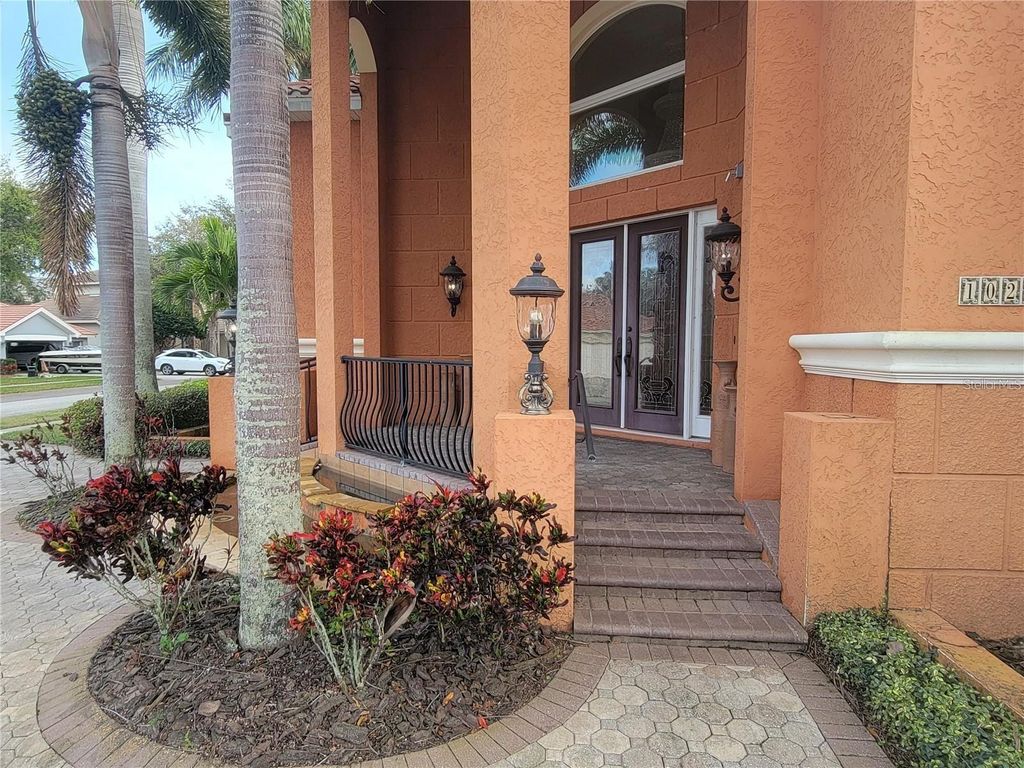 Photo of 10209 Thurston Groves Boulevard, Largo, FL 33778 (MLS # TB8473687)