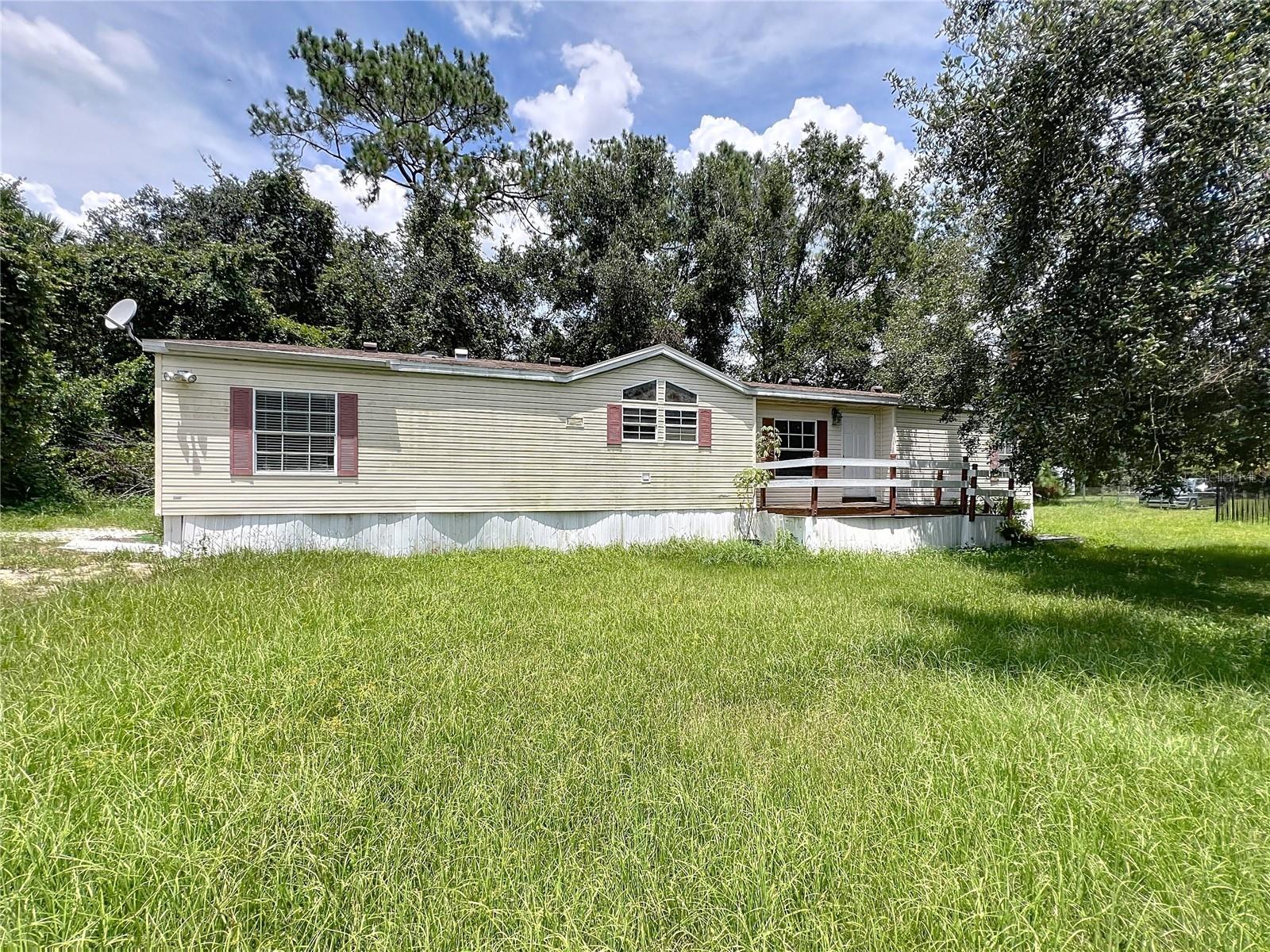 Spacious 3 Bedroom, 2 Bathroom manufactured home in Davenport, FL, sitting on 1 acre of private land. This home offers a comfortable open floor plan, and plenty of outdoor space to enjoy. Conveniently located near shopping, dining, and major highways. Perfect for those seeking privacy and room to relax! Schedule your private tour today!