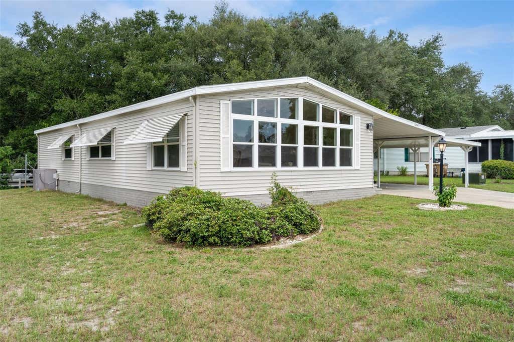Photo of 25047 Bellevue, Leesburg, FL 34748 (MLS # G5116090)