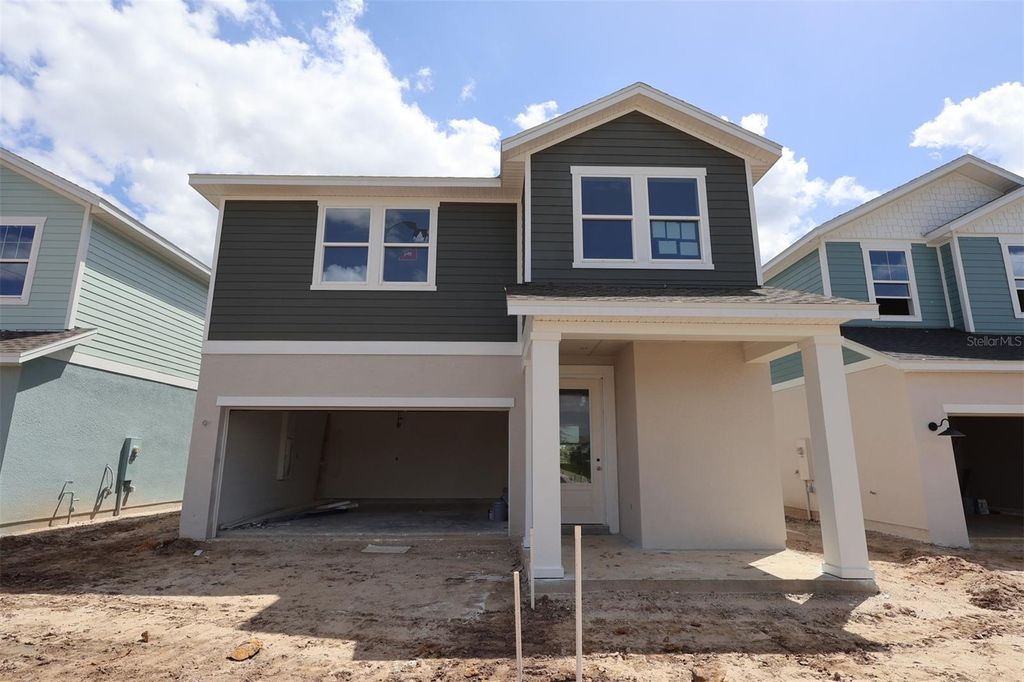 Photo of 3371 Yellow Cassia Drive, Wesley Chapel, FL 33543 (MLS # TB8500116)