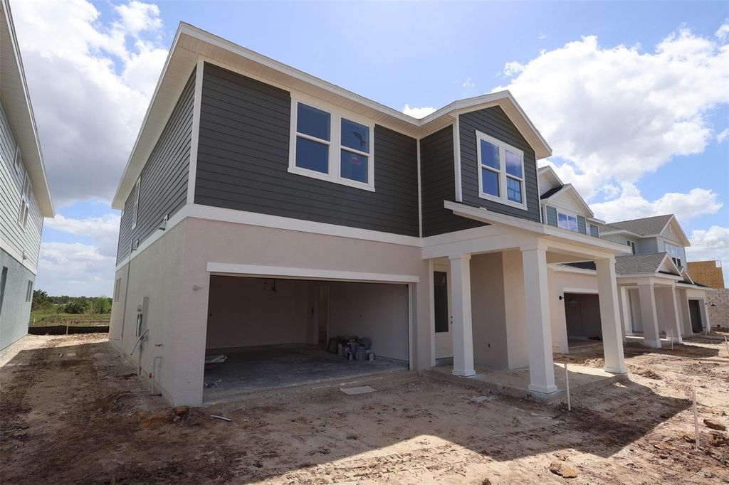 Photo of 3371 Yellow Cassia Drive, Wesley Chapel, FL 33543 (MLS # TB8500116)