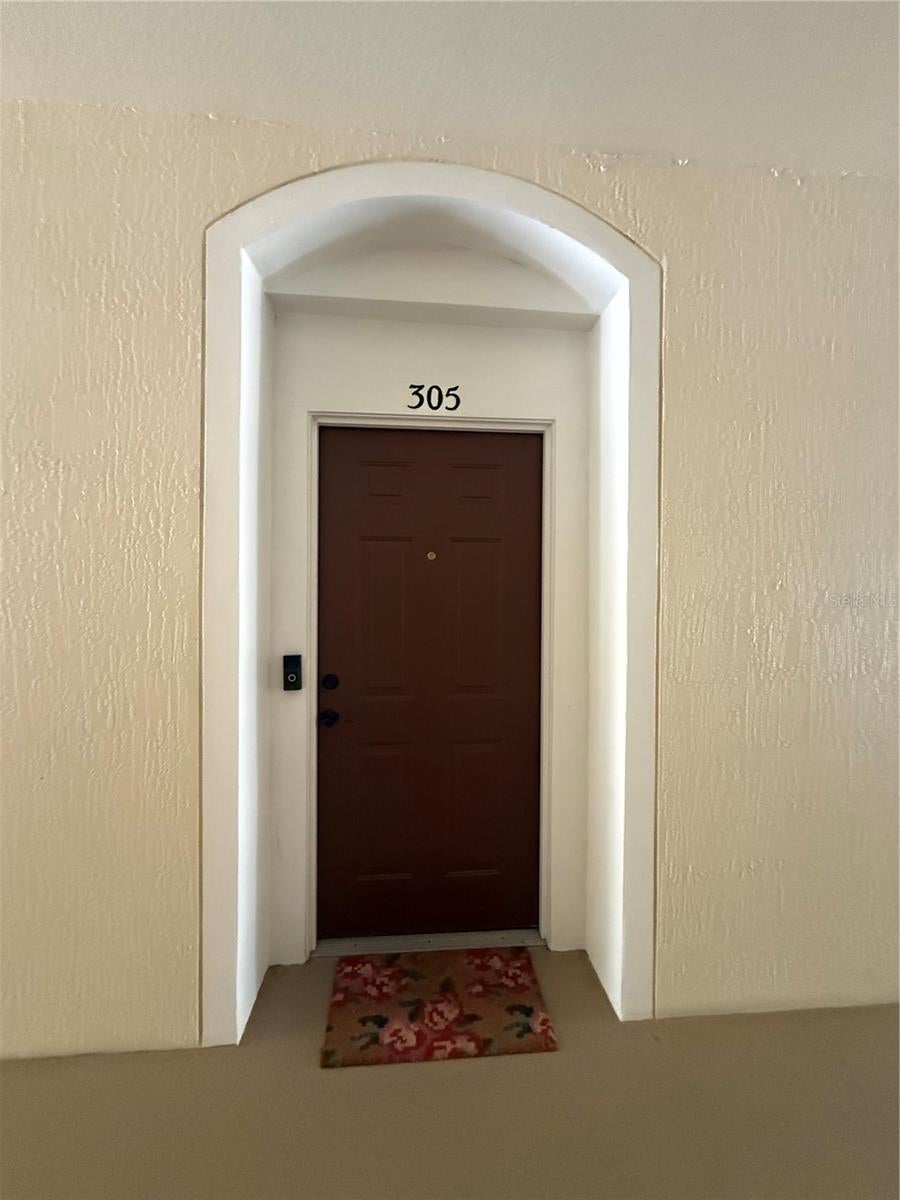 Photo of 6214 Stevenson Drive #305, Orlando, FL 32835 (MLS # O6428102)