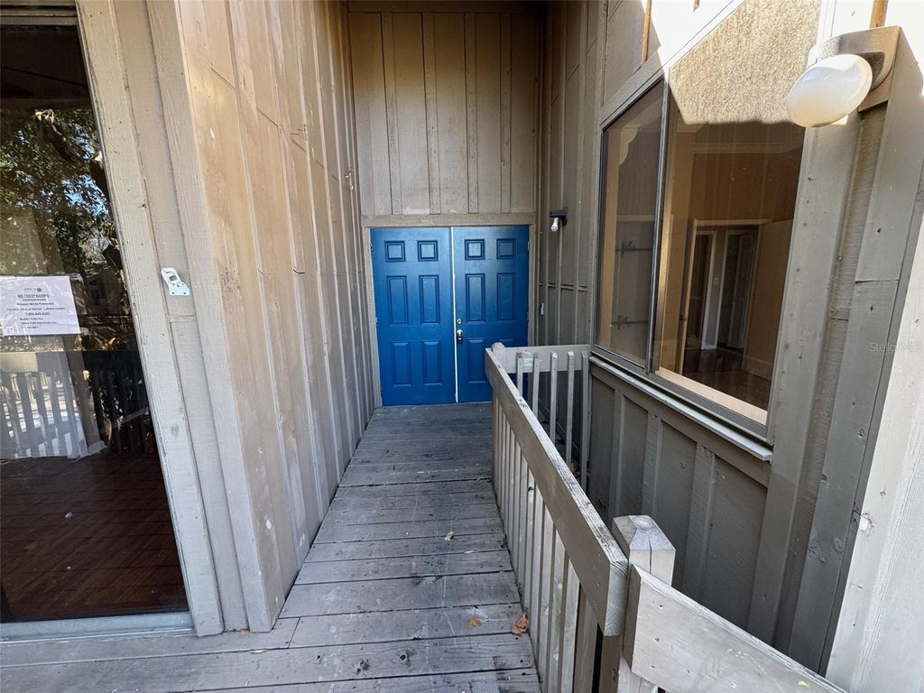 Photo of 4842 Pebble Beach Drive #1006C, Orlando, FL 32811 (MLS # O6380604)