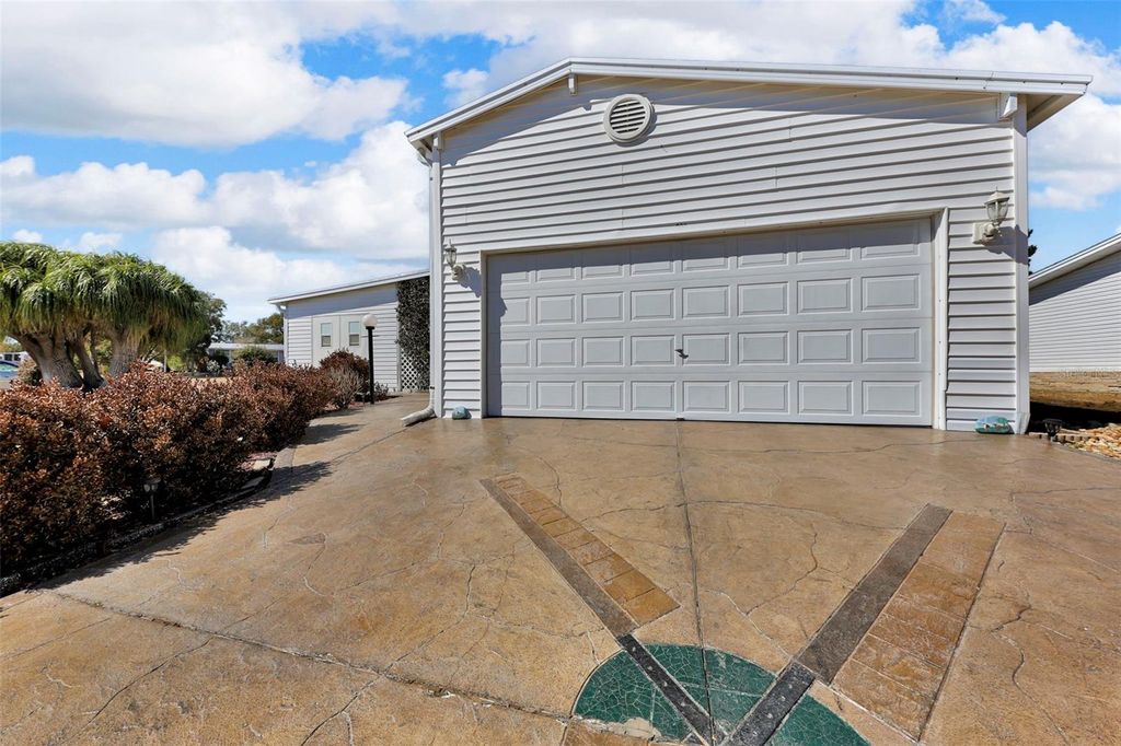 Photo of 203 Challenger Avenue, Davenport, FL 33897 (MLS # O6380562)