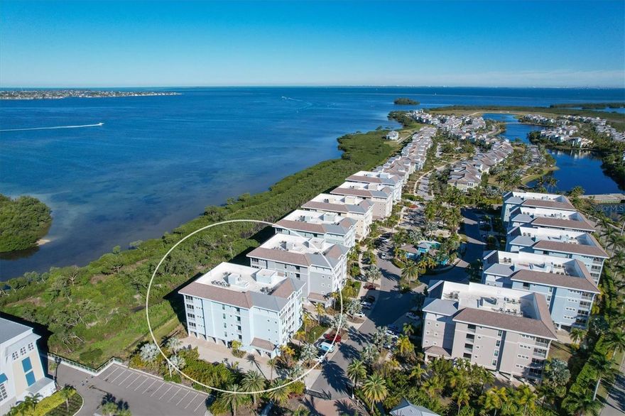 Experience the joy of coastal living in this delightful waterfront condo located in One Particular Harbour, within the prestigious Harbour Isle community. This stunning third-floor unit offers breathtaking views of Anna Maria Sound and Anna Maria Island, allowing you to indulge in spectacular sunsets each evening. This condo provides a stylish and comfortable retreat. The open plan kitchen, dining and living rooms all have waterfront views. The primary suite with ensuite bath and walk-in closet has spectacular views you can wake to each morning. There's another guest bedroom with ensuite bath and the third has an adjacent full bath with tub and shower. The inside laundry is conveniently located near these bedrooms. This unit comes with a carport and large storage room for bikes and beach toys.

Nestled on Perico Island in Bradenton, Florida, this gated community is just 2 miles from the world-famous beaches of Anna Maria Island. Neal Preserve is just across the street and has an observation tower and walking trails. Perico Preserve is just east of Harbour Isle and leads to Robinson Preserve. You'll enjoy an abundance of outdoor activities like bike riding, hiking, kayaking, paddleboarding, birdwatching and jet skiing. The condo is part of a vibrant community featuring an array of amenities designed for relaxation and recreation. Residents can enjoy a neighborhood heated pool as well as a luxurious community heated pool and spa at the stunning clubhouse, which also includes a well-equipped fitness center. For those who enjoy the outdoors, the community offers a private beach and scenic walking trails lined with hammocks for lounging and relaxation.

Whether you’re seeking a peaceful retreat or a vibrant lifestyle filled with leisure activities, this condo is an ideal choice for full-time living or as a vacation getaway. Living in this luxury condo means you’ll be just steps away from the Compass Hotel and Floriday's waterfront restaurant, providing convenient dining and leisure options right at your doorstep. Enjoy casual meals or fine dining while soaking in the beautiful waterfront views. Embrace the unparalleled opportunity to live in a lively waterfront setting that combines natural beauty with upscale living. Make this luxury condo your new home and start creating unforgettable memories in this idyllic coastal paradise.