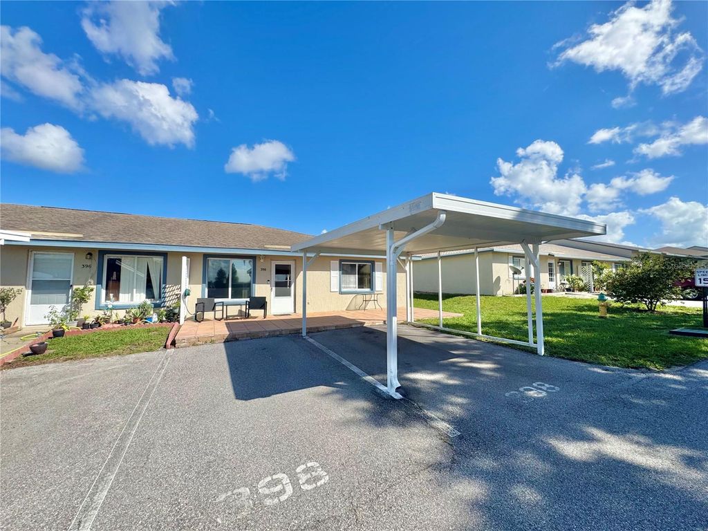 Photo of 398 Winter Ridge Boulevard #398, Winter Haven, FL 33881 (MLS # P4936615)