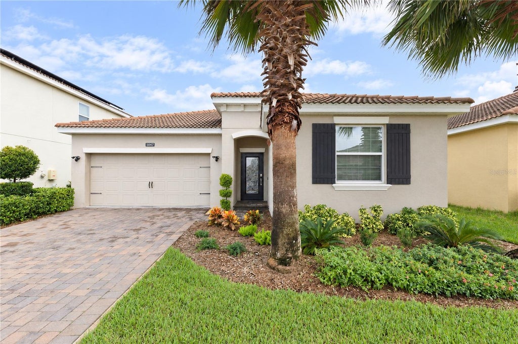 Photo of 1047 Oak Bluff Drive, Davenport, FL 33837 (MLS # O6449163)