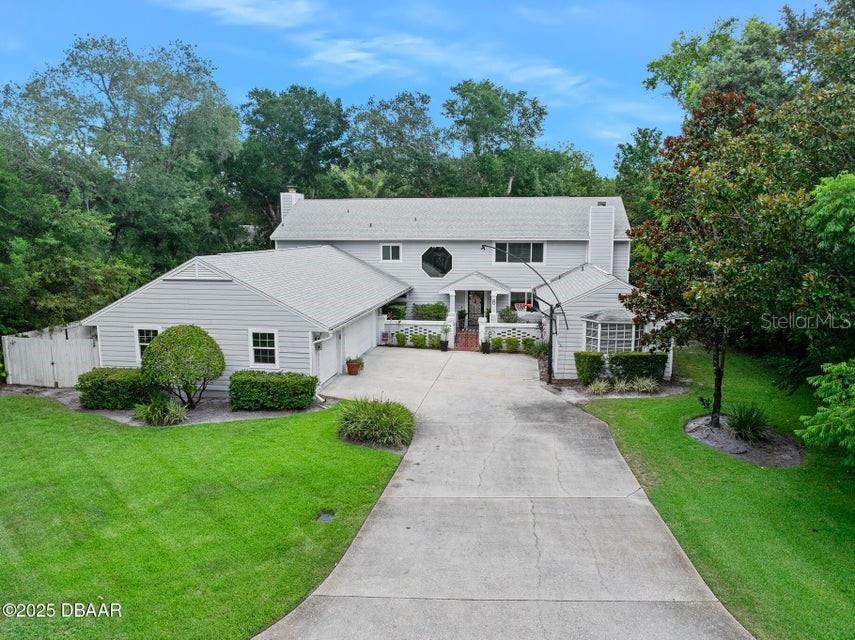 Stunning home on a quiet cul-de-sac in the desirable Trails neighborhood. Absolutely beautiful renovations create the comfortable, casual atmosphere that encompasses the 6 bedroom, 6.5 bath home with lovely living and dining spaces that overlook the private oak shaded lawn and patio. The unique layout is ideal for guests or multi generational living with several private suites including the complete guest quarters with dedicated courtyard entrance, full kitchen, laundry, living, dining, 1.5 baths and bedroom. The beautiful island kitchen floats into the great room with workspace that overlooks the sprawling lawn. Dining and living room flow together and enjoy plenty of natural light through generous windows that allow the outdoors in. Two of the six bedrooms share a unique attached and shared bonus room that allows the occupants to spread out and relax. More...
Private Remarks: Call Casey Shorter with any questions (386) 852-1030