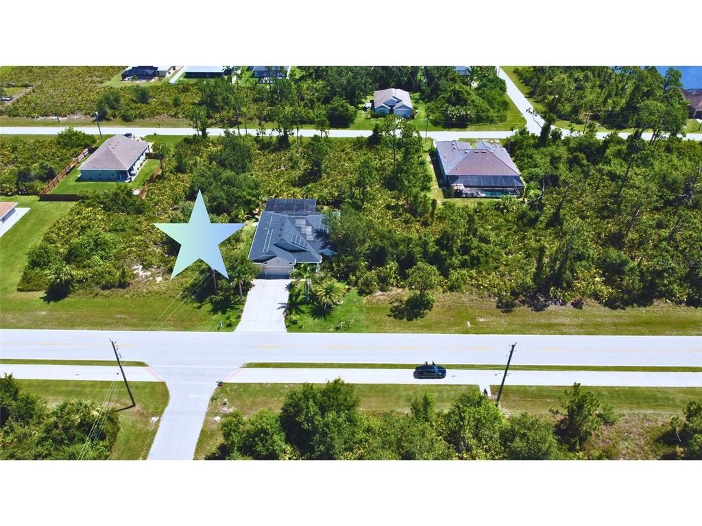 Photo of 13332 Keystone Boulevard, Port Charlotte, FL 33981 (MLS # D6142864)