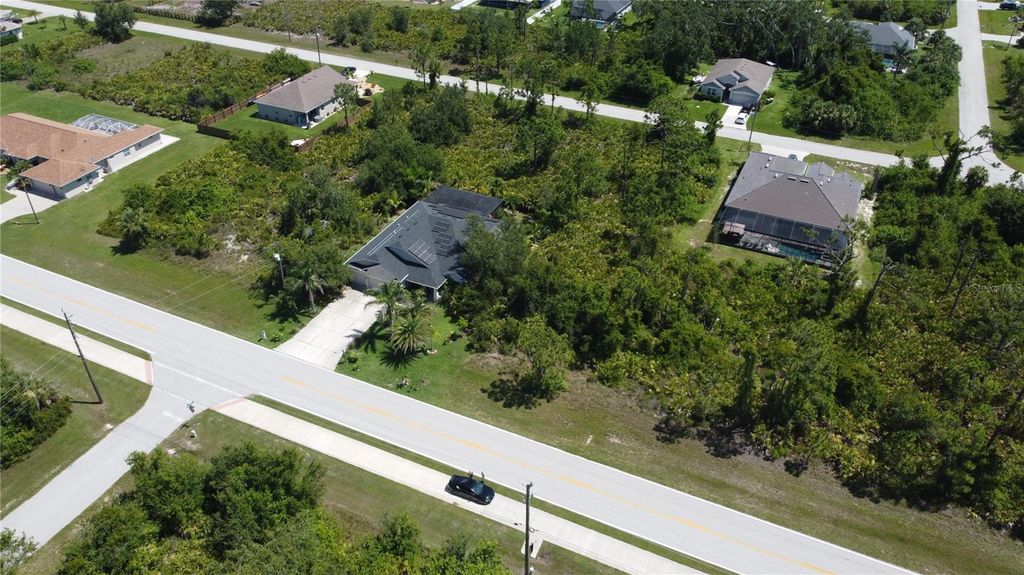 Photo of 13332 Keystone Boulevard, Port Charlotte, FL 33981 (MLS # D6142864)