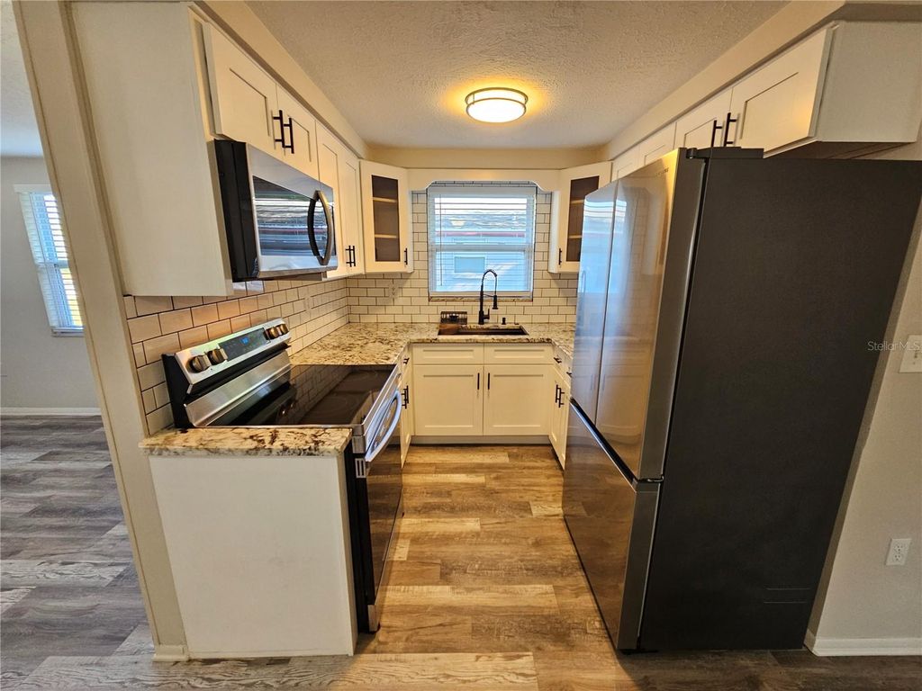 Photo of 4849 Camphor Avenue, Sarasota, FL 34231 (MLS # R4910938)