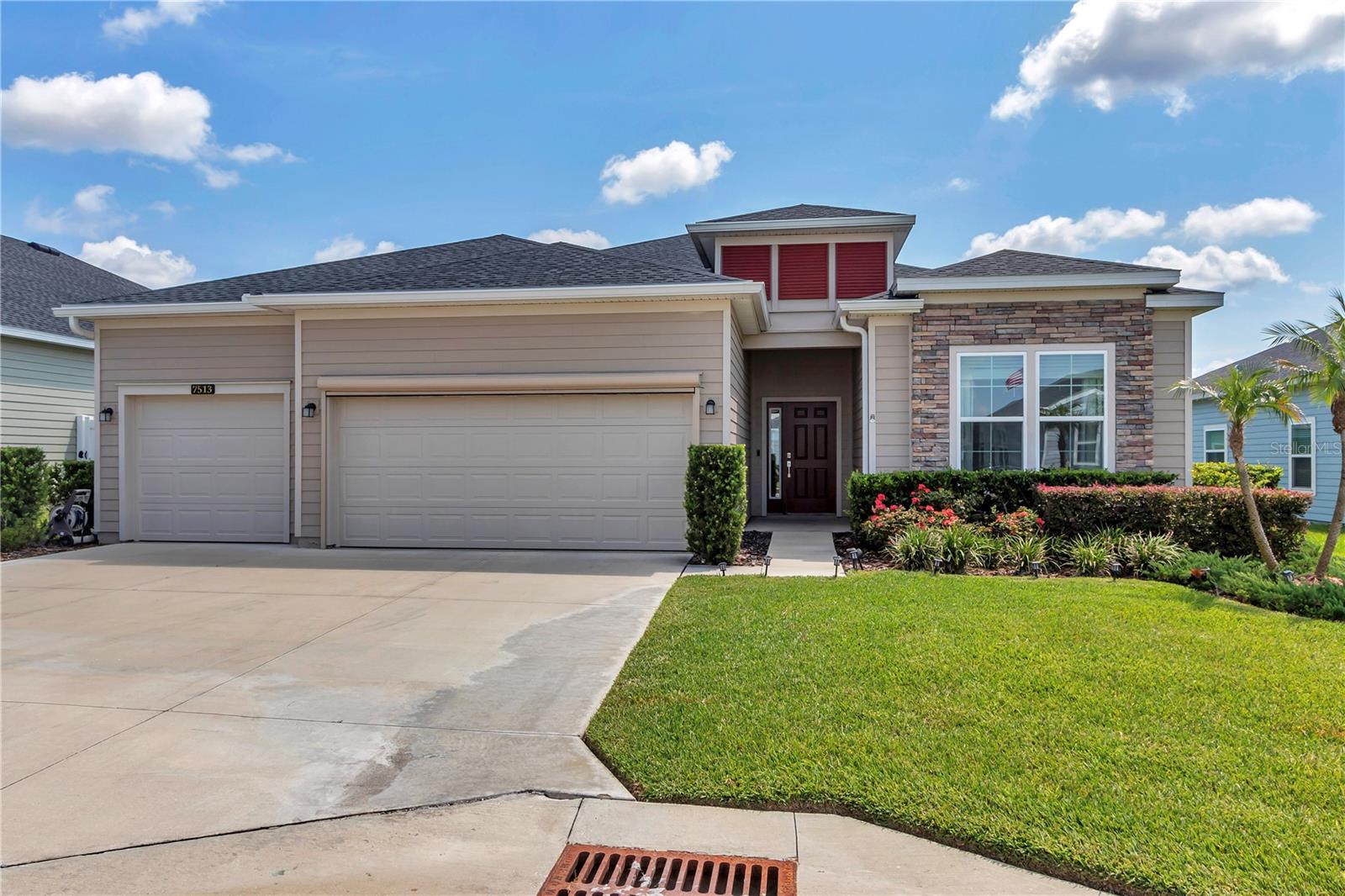This is the opportunity you have been waiting for. ASSUMABLE MORTGAGE AT 4.375%, $9000 CTM. Beautiful upgraded home in a quiet 55 Plus neighborhood. This beautifully upgraded home exudes style and comfort, perfect for those seeking a blend of elegance and functionality. Upon entering, you're greeted by white 42" cabinets with crown molding, complemented by quartz countertops and an island, creating an ideal space for entertaining guests. Transition seamlessly through the rolling wall to the covered, screened lanai, offering a serene retreat. Inside, the home boasts gorgeous wood-inspired tile throughout all living areas, adding warmth and sophistication. With four bedrooms and two full baths, including a primary bedroom featuring a large closet, two sinks, and a huge shower. There's ample space for relaxation and privacy. Seller has added many upgrades that include a new top-of-the-line walk-in bathtub with jets, a water filtration system, an epoxy garage floor, and a retractable screen. Curbing around all plant beds, gutters, and pavers leading to your new home. Residents can enjoy a covered pavilion, community pool, and recreational amenities such as bocce, pickleball, and shuffleboard, promising endless opportunities for leisure and socializing. Conveniently located near restaurants and shopping, and just fifteen minutes from the prestigious World Equestrian Center and Shalom Park. This home offers a lifestyle of convenience and luxury in a vibrant community setting.