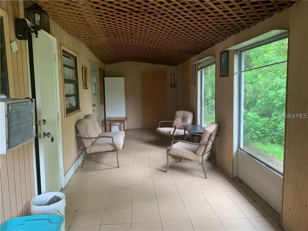 Photo of 304 Ortiz Boulevard #4, North Port, FL 34287 (MLS # C7514297)
