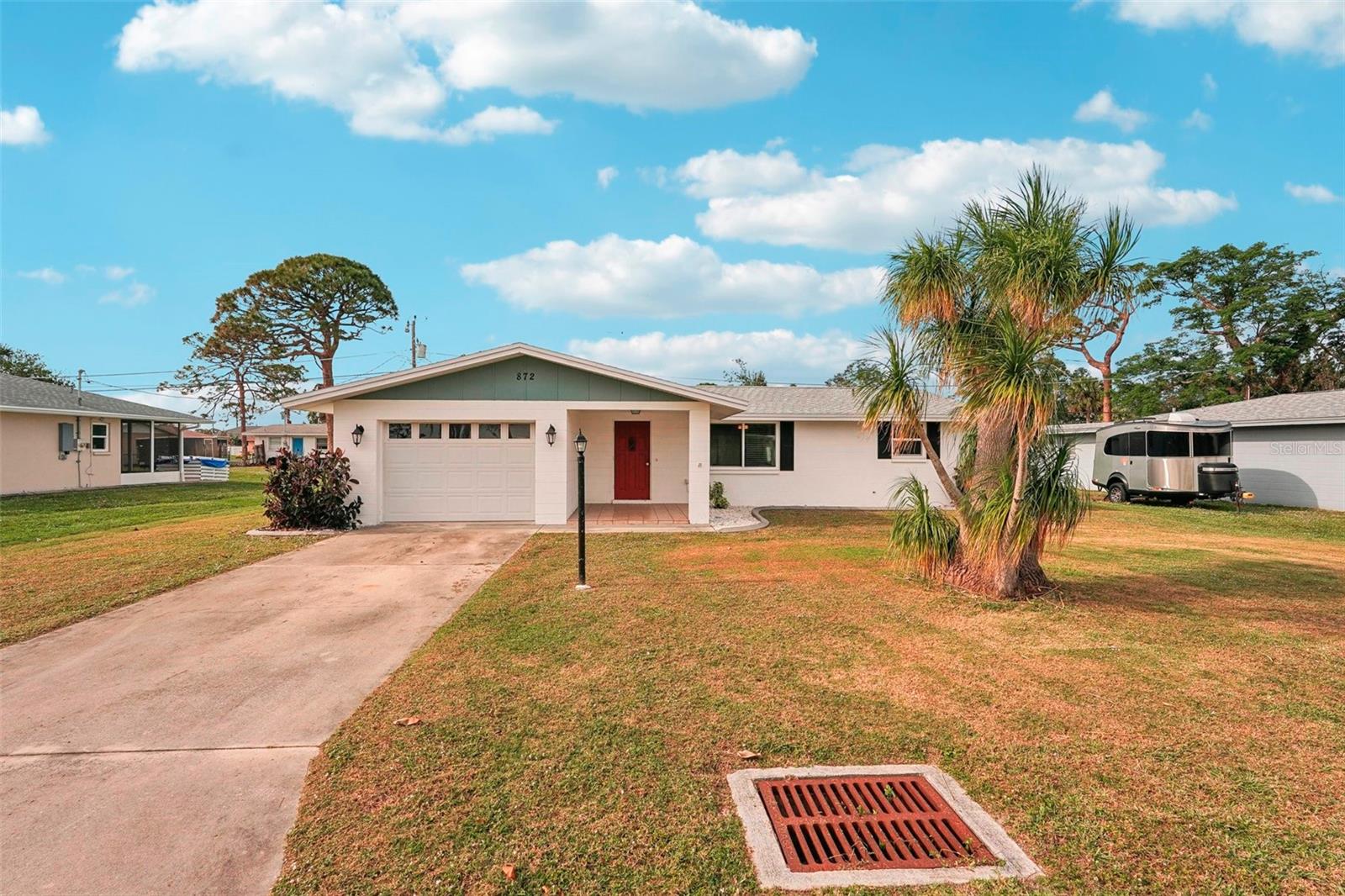 Located in a prime location of SOUTH VENICE! The owner has taken great care of this home and made some upgrades. NO CARPET throughout this home, it is being sold turnkey furnished with exception of a few items in garage. NEW SHINGLE ROOF IN APRIL 2022, HURRICANE WINDOWS REPLACED IN AUGUST 2022 (except the windows in the enclosed porch) UPDATED VANITIES IN BATHROOMS, UPDATED KITCHEN WITH GRANITE COUNTERTOPS, NEW WATER SOFTENER IN 2023, NEW HOT WATER TANK IN FEBRUARY 2024 and new ac 2024! Lots of LIGHT shines through the ENCLOSED PORCH, HUGE DOUBLE LOT making in endless for possibilities! 8 X 10 STORAGE SHED for extra storage convenience. You can join the South Venice Civic Association with access to the beach or boat dock. Just a FEW MINUTES from local beaches, shopping and dining. Call today for your private tour of this home!