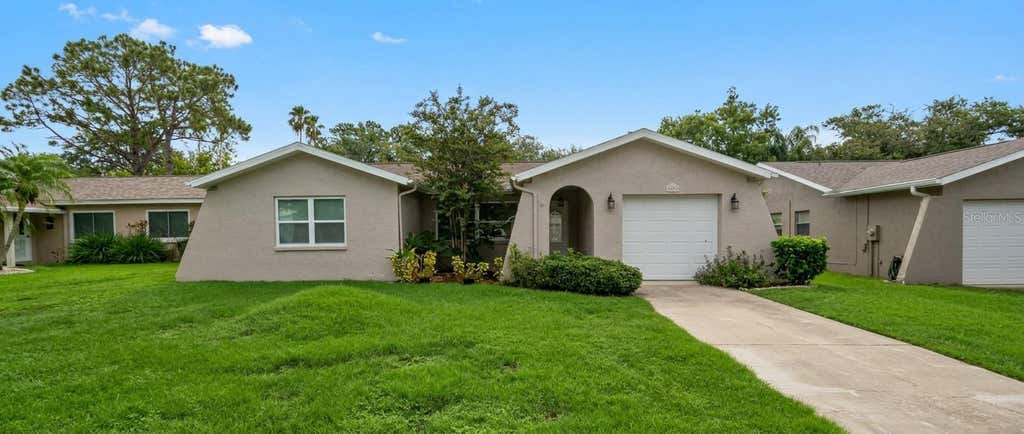 Photo of 1633 St Catherine Drive E, Dunedin, FL 34698 (MLS # TB8537696)